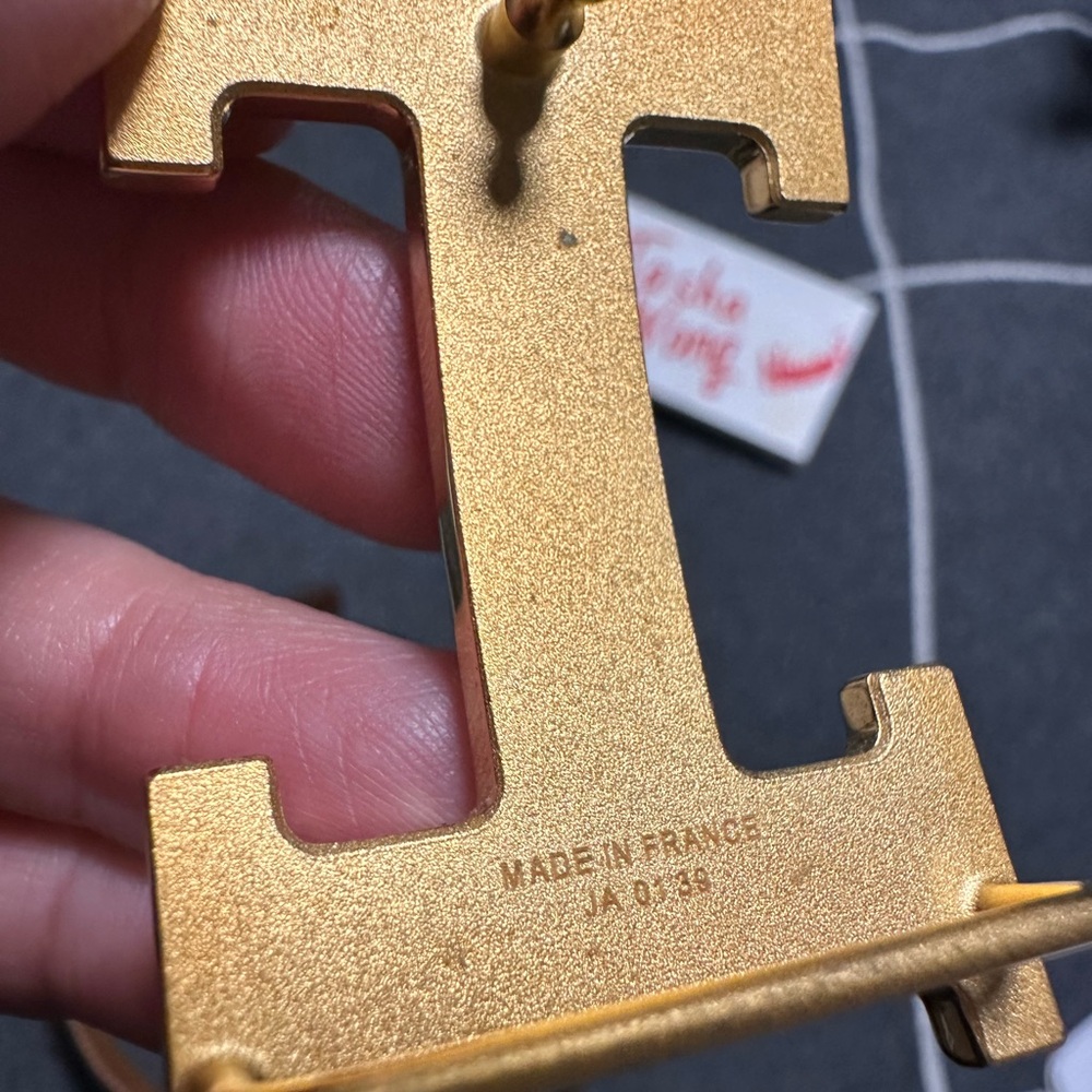 Hermes Gold buckle and reversible gold burgundy belt strap